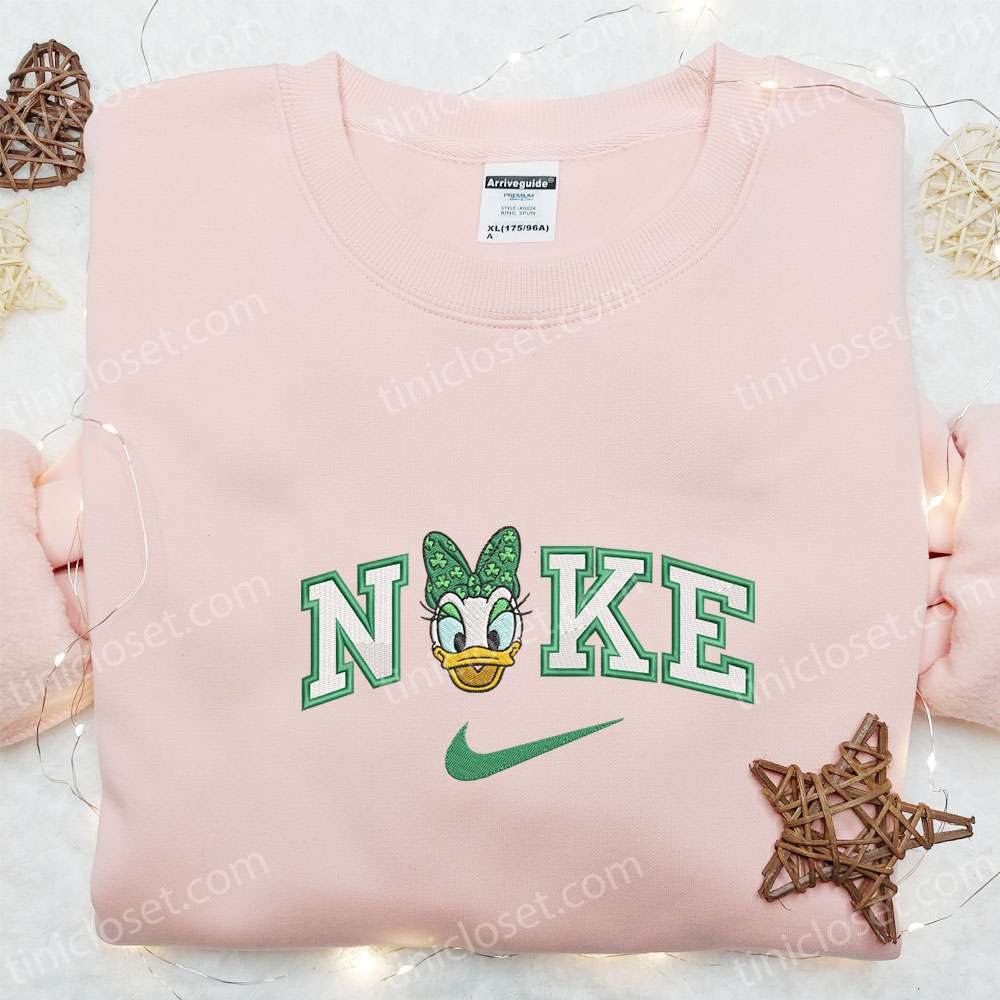 Daisy Wears Shamrock Bow X Nike Embroidered Shirt, Disney Characters Embroidered Shirt, Saint Patrick’s Day Embroidered Hoodie