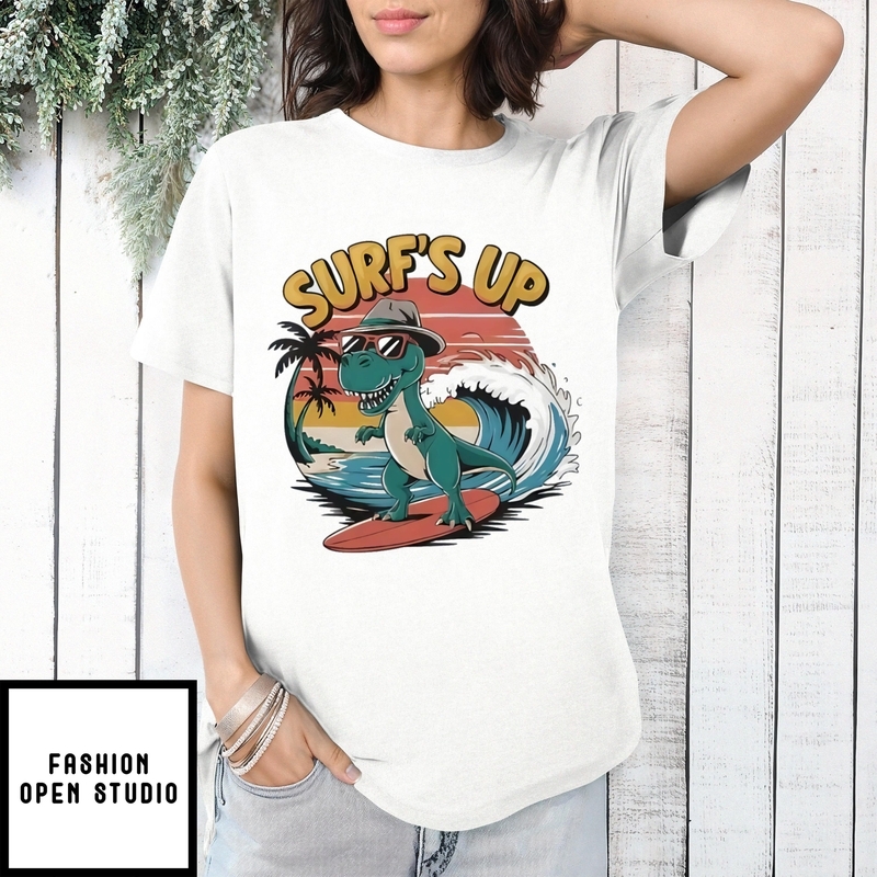 Dino Surf’s Up Dinosaur Wearing Sunglasses And A Hat T-shirt