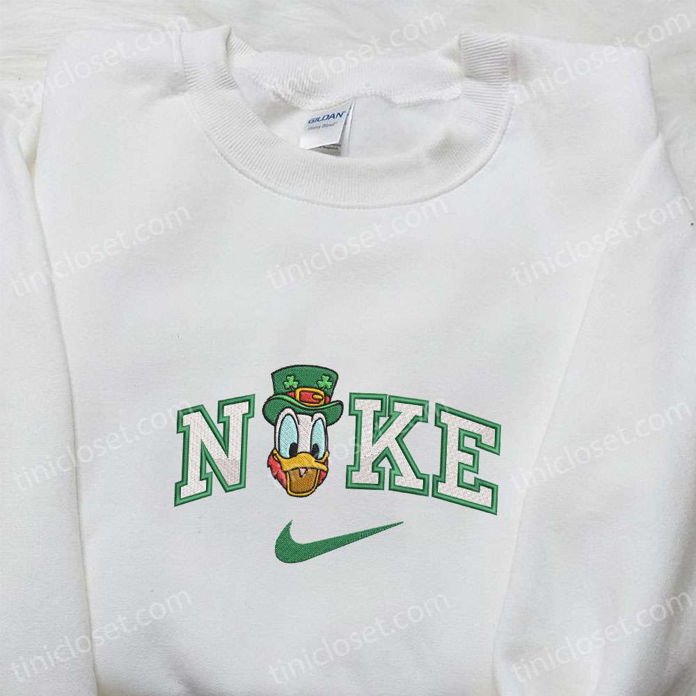Donald Wears Shamrock Hat X Nike Embroidered Shirt, Disney Characters Embroidered Shirt, Saint Patrick’s Day Embroidered Hoodie