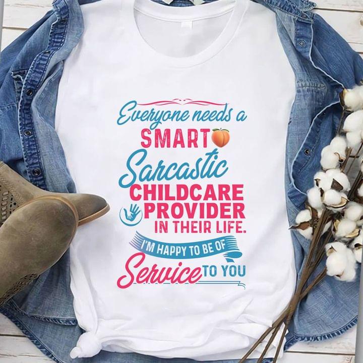 Everyone Needs A Smart Sarcastic Childcare Provider In Their Life I'm Happy To Be Of Service To You Peach Hands Holding Shirt